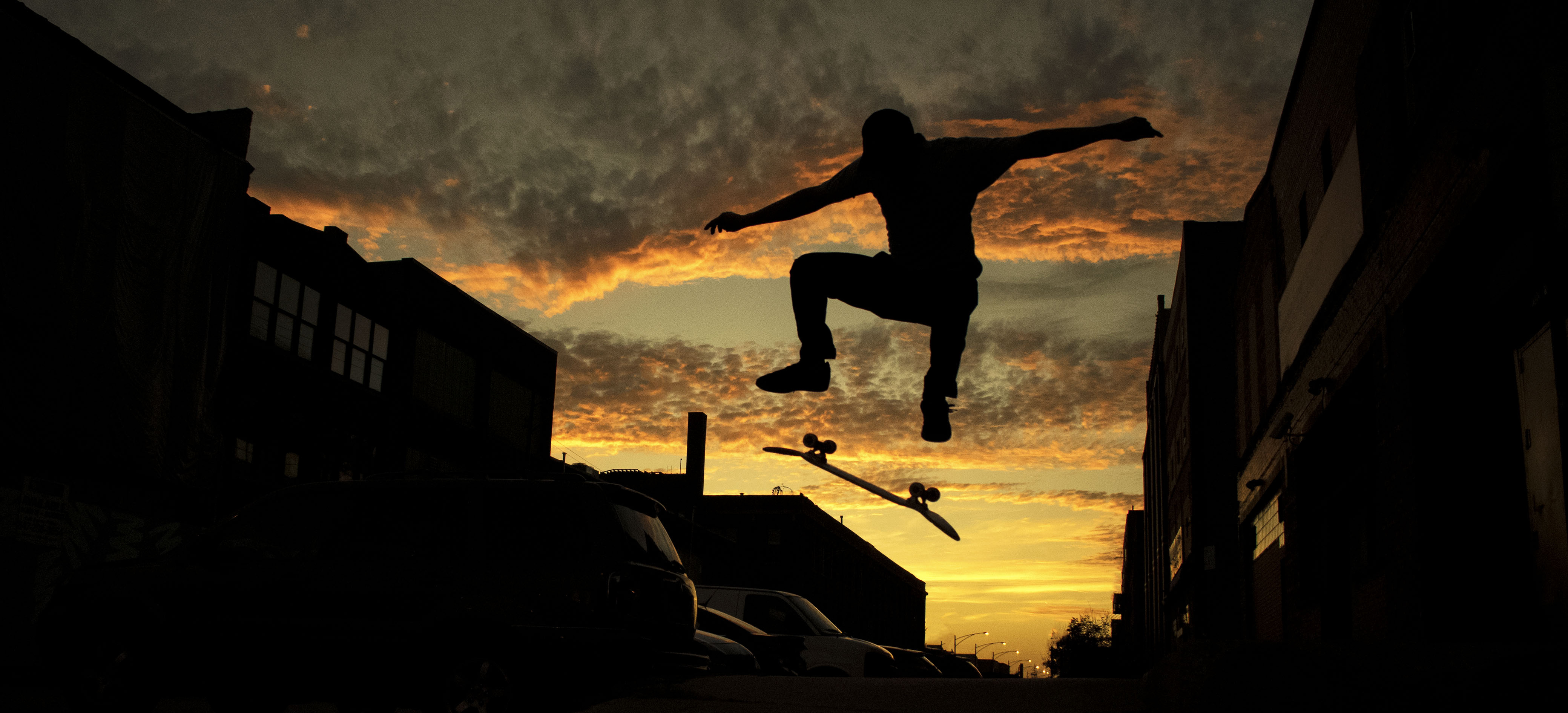 Art & Design Student Exhibition, silhouette of man skateboarding